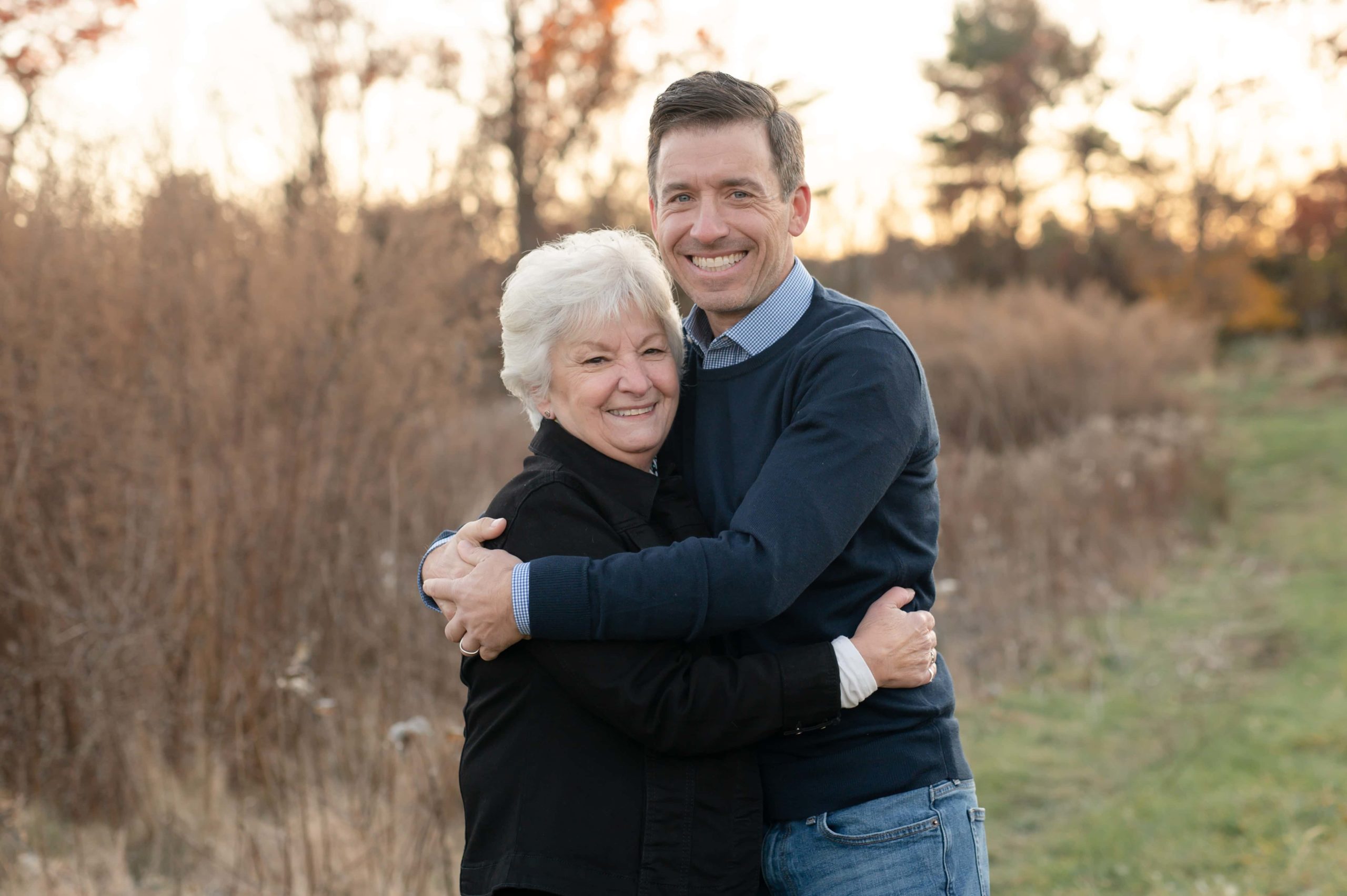 Family photos in fall with mother and son