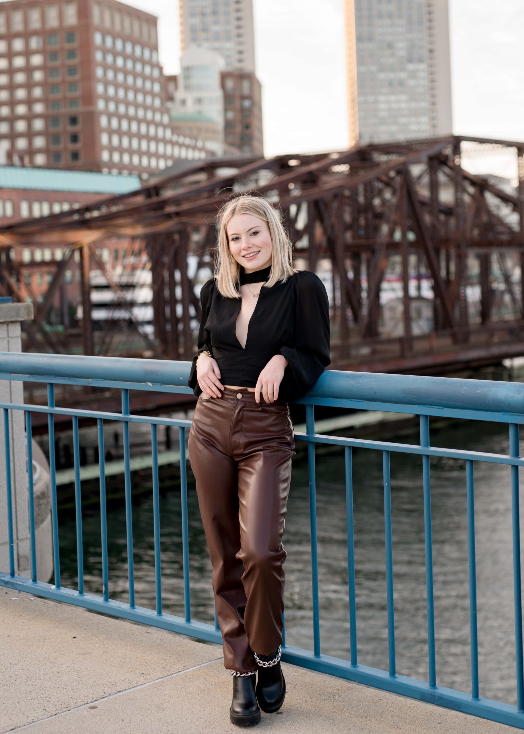 Senior pictures in front of the bridge in Seaport
